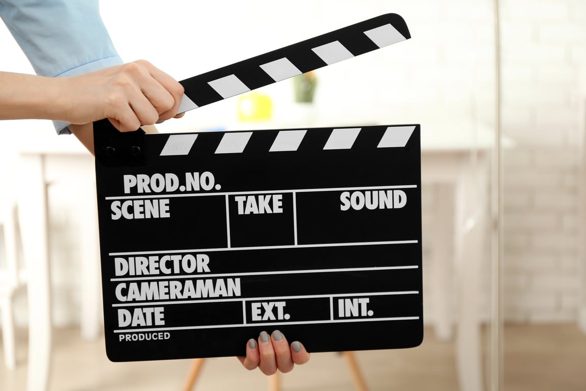 Woman Hands Holding Film Clapper